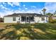 Home exterior and spacious backyard at 12385 Prudential Ave, Port Charlotte, FL 33981