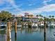 View of the marina and clubhouse with boats docked at 128 Sea Anchor Dr, Osprey, FL 34229