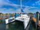 Catamaran sailboat in the marina on a sunny day at 128 Sea Anchor Dr, Osprey, FL 34229