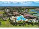 Aerial view of community amenities including pool, tennis courts, and clubhouse at 13376 Caravaggio Ct, Venice, FL 34293