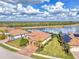 Single-story home with tile roof and lake view at 13376 Caravaggio Ct, Venice, FL 34293