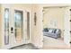 Bright entryway with an open view to a sitting area at 13376 Caravaggio Ct, Venice, FL 34293