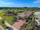 Single-story house with tile roof and lush landscaping at 13463 Nobilio St, Venice, FL 34293