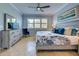 Main bedroom with a king-size bed and calming decor at 13463 Nobilio St, Venice, FL 34293