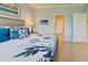 Spacious bedroom with ensuite bathroom access and relaxing decor at 13463 Nobilio St, Venice, FL 34293