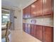 Spacious kitchen with ample cabinetry and granite countertops at 13463 Nobilio St, Venice, FL 34293