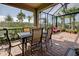 Enjoy dining and relaxing in this screened patio at 13463 Nobilio St, Venice, FL 34293