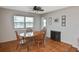 Cozy dining area featuring tile floors and a ceiling fan for added comfort at 1600 Lilliput Ct, Venice, FL 34293