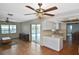 Living room featuring a dining area, a view of the pool, and natural light at 1600 Lilliput Ct, Venice, FL 34293