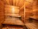 Wood-paneled sauna offering a relaxing space with built-in benches for a soothing experience at 17 Nautical Dr, North Port, FL 34287