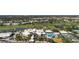 Aerial view of community amenities including golf, tennis, pool, and clubhouse at 174 Southampton S Pl # 345, Venice, FL 34293