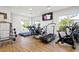 Well-equipped gym featuring treadmills, elliptical machines, and a stationary bike at 174 Southampton S Pl # 345, Venice, FL 34293