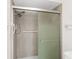 Shower with glass door and updated fixtures at 1773 Hudson St, Englewood, FL 34223