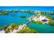 Aerial view of bridge and waterways with waterfront properties at 200 Pameto Rd, Nokomis, FL 34275