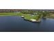 Expansive golf course and lake view with sand traps in a luxury golf community at 24065 Canterwood Way, Venice, FL 34293