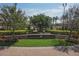 Community sign amidst lush landscaping, offering a warm welcome to Sarasota National at 24065 Canterwood Way, Venice, FL 34293