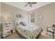 Charming bedroom with queen bed and wicker furniture at 27231 Ipswich Dr, Englewood, FL 34223