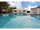 Community pool featuring plenty of space for lounging at 3020 Sail Pointe Cir # 5A, Venice, FL 34293