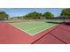 Outdoor tennis court on a sunny day, ready for a match at 3020 Sail Pointe Cir # 5A, Venice, FL 34293