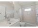 Bright bathroom with tub, shower, and decorative tiles at 3415 N Cranberry Blvd, North Port, FL 34286