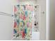 Shower with floral curtain, and silver fixtures at 3730 82Nd Avenue E Cir # 104, Sarasota, FL 34243