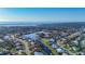 A charming residential area featuring waterfront homes along a canal, surrounded by lush landscapes at 389 Eden Dr, Englewood, FL 34223