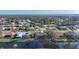 Beautiful waterfront community featuring lush landscaping and serene water views from many properties at 389 Eden Dr, Englewood, FL 34223