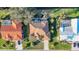 Bird's eye view of home, lush landscaping, driveway, screened-in pool and waterfront at 389 Eden Dr, Englewood, FL 34223