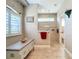 Bright bathroom featuring tiled walk-in shower, shuttered window, and decorative furnishings at 389 Eden Dr, Englewood, FL 34223