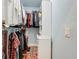 Organized walk-in closet with ample shelving and hanging space at 389 Eden Dr, Englewood, FL 34223