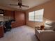 Bedroom featuring a teddy bear on a recliner next to a window, and a work space at 4052 Holin Ln, North Port, FL 34287