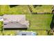 Aerial view of house and backyard, showing a large grassy area at 4309 Renwick Dr, Parrish, FL 34219