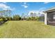 Spacious backyard offering a large grassy area at 4309 Renwick Dr, Parrish, FL 34219