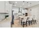 Modern kitchen with island, stainless steel appliances, and white cabinets at 4309 Renwick Dr, Parrish, FL 34219