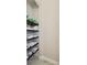 Well-organized linen closet with shelving for towels and linens at 4309 Renwick Dr, Parrish, FL 34219