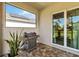 Outdoor patio with a grill and sliding glass doors at 4309 Renwick Dr, Parrish, FL 34219