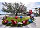 Lively downtown area featuring outdoor seating, food vendors, lush landscaping, and water features at 435 Cerromar Ln # 328, Venice, FL 34293