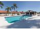 Community pool with plenty of seating for residents to enjoy the Florida sunshine at 4951 Summertree Rd, Venice, FL 34293