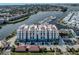 Luxury waterfront condos boast red tile roofs, bay views, and a private marina with easy access to the open water at 501 Tamiami N Trl # 502, Venice, FL 34285