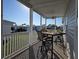 Inviting outdoor porch featuring comfortable seating and a beautiful view at 530 Walnut Cir, Venice, FL 34285