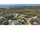 Aerial view captures the home, neighboring properties, and nearby river at 5694 Hale Rd, Venice, FL 34293