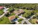 Aerial view of a well-manicured lawn and a home with a detached garage at 5694 Hale Rd, Venice, FL 34293