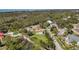 An aerial view shows the home's positioning relative to the neighboring woods at 5694 Hale Rd, Venice, FL 34293