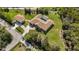 A bird's eye view of the property shows the beautiful landscaping at 5694 Hale Rd, Venice, FL 34293