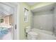 Bathroom with tub and door to pool at 5694 Hale Rd, Venice, FL 34293