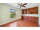 Bedroom with built-in wood cabinets and natural light at 5694 Hale Rd, Venice, FL 34293