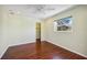 Bedroom with hardwood floor and closet at 5694 Hale Rd, Venice, FL 34293