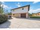 Exterior shot shows a private garage entrance with a well-manicured lawn at 5694 Hale Rd, Venice, FL 34293