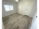 Empty bedroom featuring a window and two closets at 590 Portside Dr, North Port, FL 34287