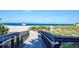 Walkway to the beach with ocean view at 600 Nasturtium Ct, Nokomis, FL 34275